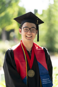 Nathan Theng, College of Science and Mathematics, in graduation robes.