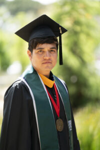 Orlando Tapia, Jordan College of Agricultural Sciences and Technology, in graduation robes.