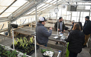Students inside the Fresno State nursery