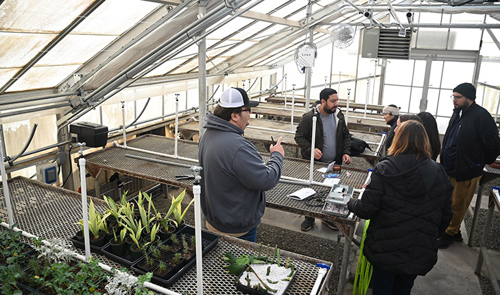 Students inside the Fresno State nursery